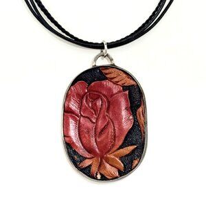 Paul Brackna Hand Tooled Leather Rose in a Sterling Open Bezel w/Leathre Cord